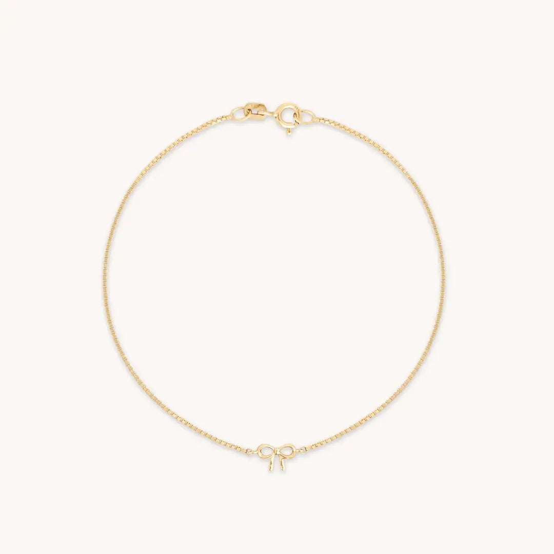 14k guldarmband med rosettberlock